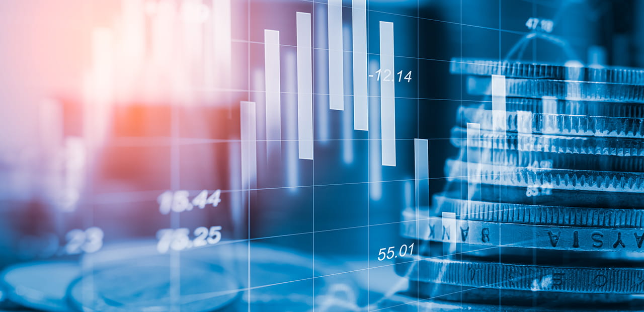 Finance charts/graphs and stack of coins